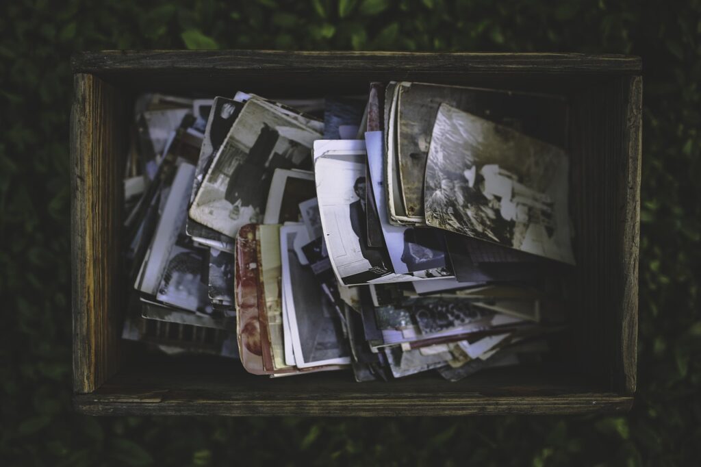 Box filled with old photos.